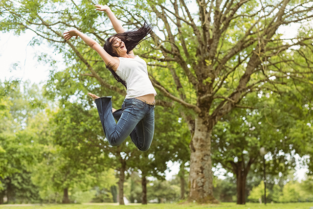 constipation-woman-jumping-happy